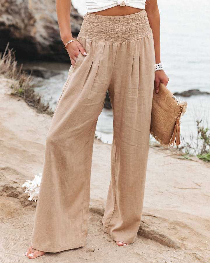 Lily – Flowy Flared Trousers